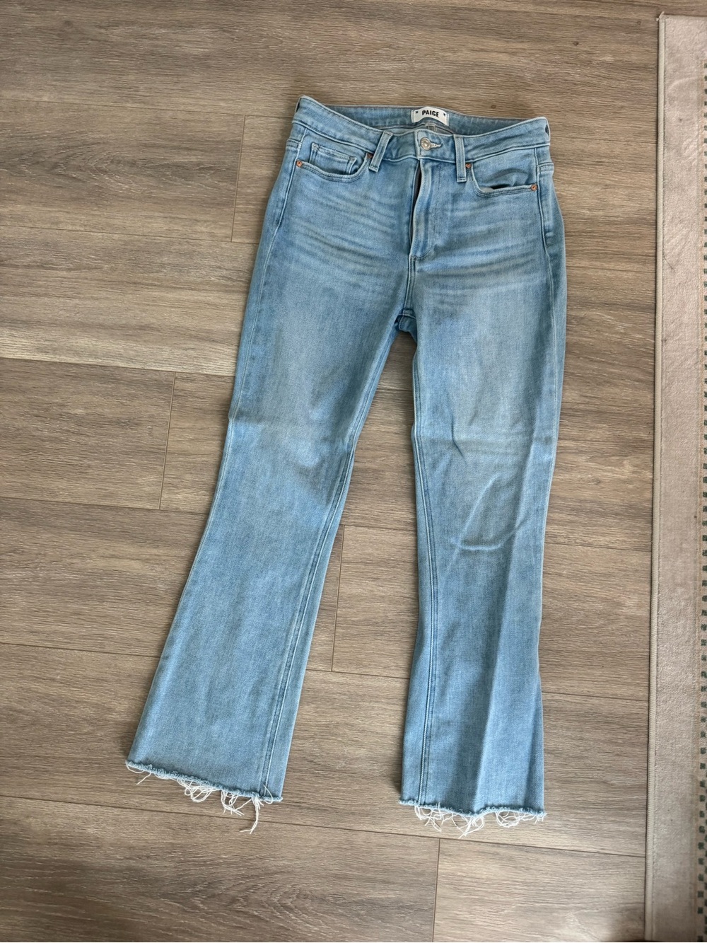 PAIGE Light Wash Flare Jeans in Light Blue